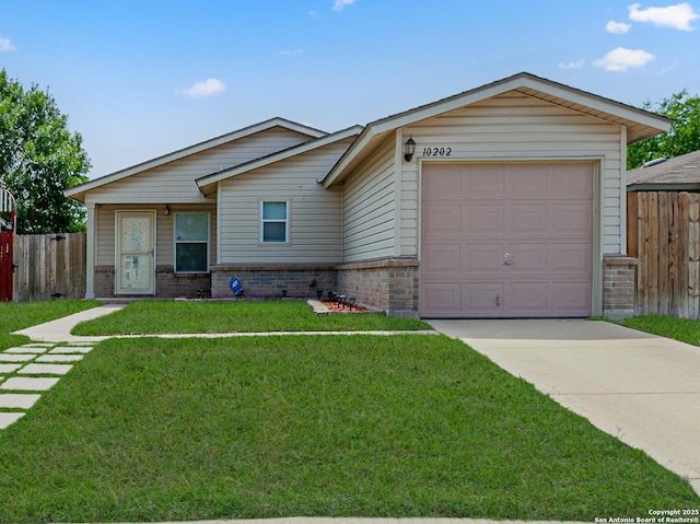 10202 Misty Pln, San Antonio, TX 78245 - ranch-style home featuring brick siding, concrete driveway, and an attached garage