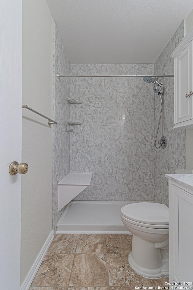10202 Misty Pln, San Antonio, TX 78245 - bathroom with toilet, a shower, and vanity