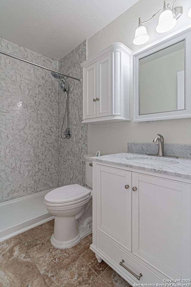 10202 Misty Pln, San Antonio, TX 78245 - full bath featuring toilet, a stall shower, and vanity