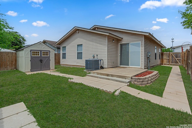 10202 Misty Pln, San Antonio, TX 78245 - rear view of property with central air condition unit, a storage unit, a patio area, and an outdoor structure
