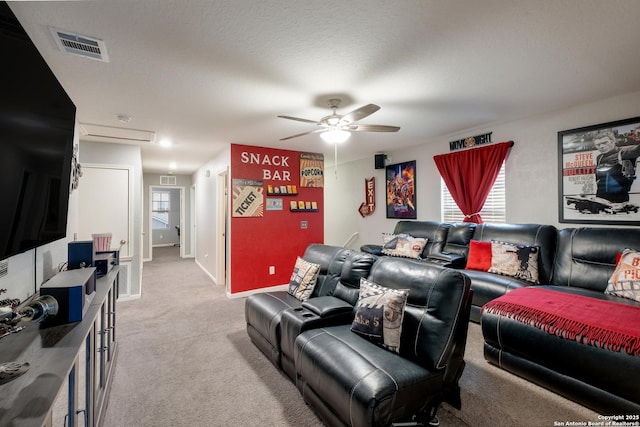 14383 Palm Rdg, San Antonio, TX 78253 - living room featuring light carpet, ceiling fan, and baseboards