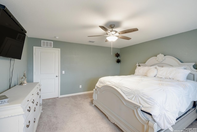 14383 Palm Rdg, San Antonio, TX 78253 - bedroom with light carpet, baseboards, and ceiling fan