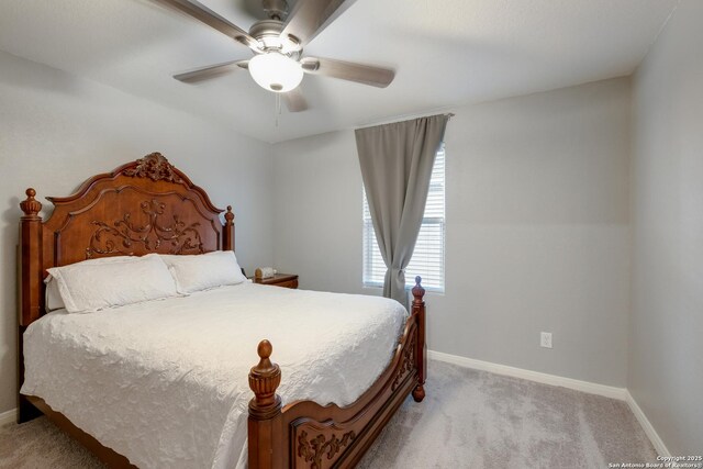 14383 Palm Rdg, San Antonio, TX 78253 - bedroom with baseboards, light carpet, and ceiling fan
