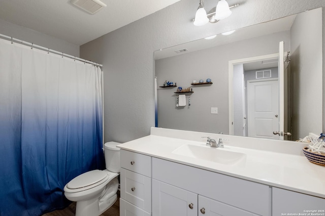 14383 Palm Rdg, San Antonio, TX 78253 - bathroom with toilet, vanity, wood finished floors, and curtained shower