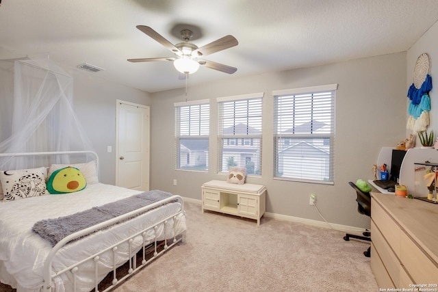 14383 Palm Rdg, San Antonio, TX 78253 - bedroom featuring light carpet, baseboards, and ceiling fan