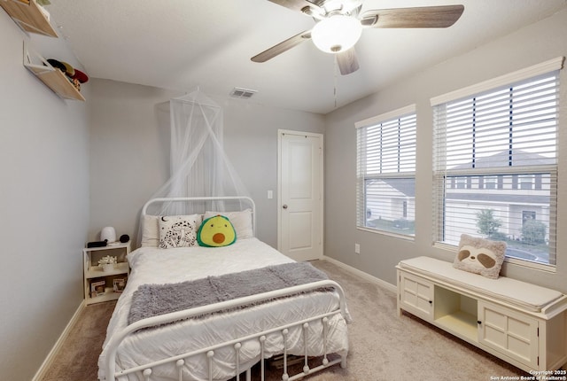 14383 Palm Rdg, San Antonio, TX 78253 - bedroom with light carpet, baseboards, and ceiling fan