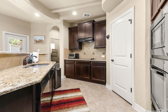 13706 Trailside, Live Oak, TX 78233 - kitchen featuring black appliances, under cabinet range hood, backsplash, a sink, and recessed lighting