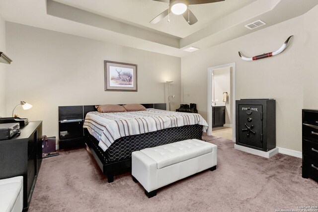 13706 Trailside, Live Oak, TX 78233 - bedroom featuring carpet floors, a tray ceiling, connected bathroom, and baseboards