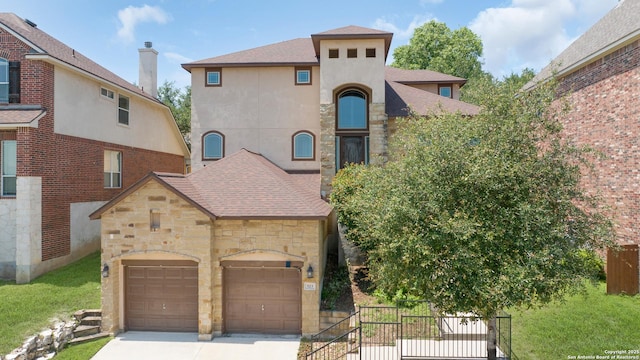 523 White Cyn, San Antonio, TX 78260 - view of front of house featuring concrete driveway, stucco siding, stone siding, roof with shingles, and fence
