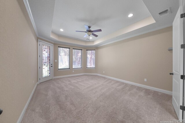 523 White Cyn, San Antonio, TX 78260 - unfurnished room with light carpet, a ceiling fan, a raised ceiling, recessed lighting, and baseboards