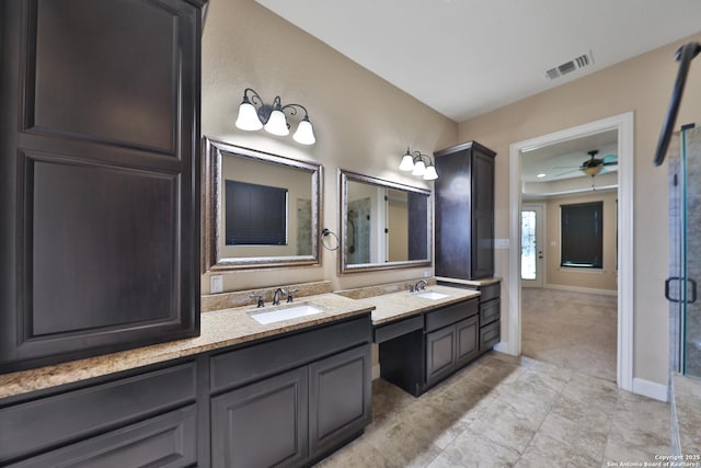 523 White Cyn, San Antonio, TX 78260 - full bathroom featuring a ceiling fan, double vanity, and baseboards