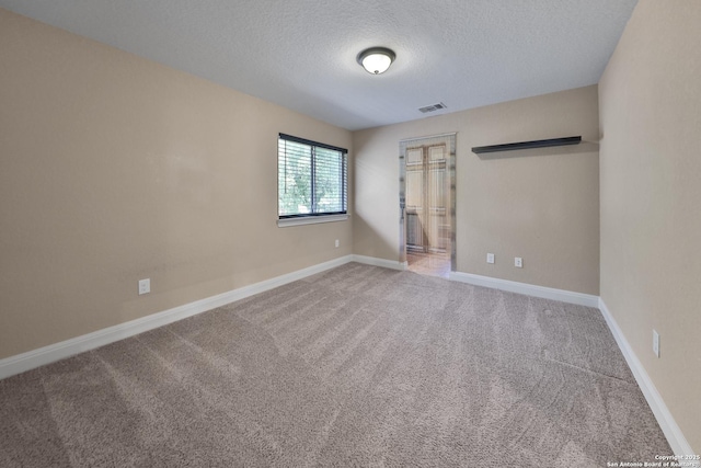 523 White Cyn, San Antonio, TX 78260 - unfurnished room featuring a textured ceiling, carpet, and baseboards