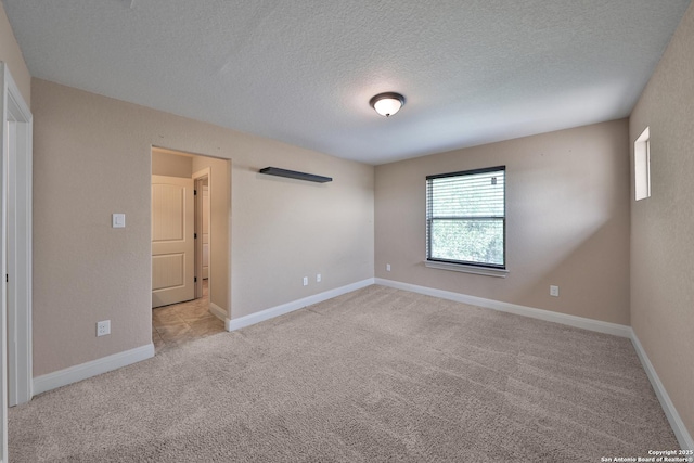 523 White Cyn, San Antonio, TX 78260 - unfurnished room featuring a textured ceiling, carpet flooring, and baseboards