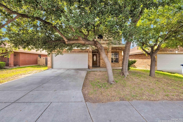6818 Sabine Pass, San Antonio, TX 78242 - obstructed view of property featuring concrete driveway, brick siding, and a garage