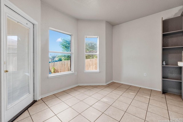 6818 Sabine Pass, San Antonio, TX 78242 - empty room featuring light tile patterned flooring and baseboards