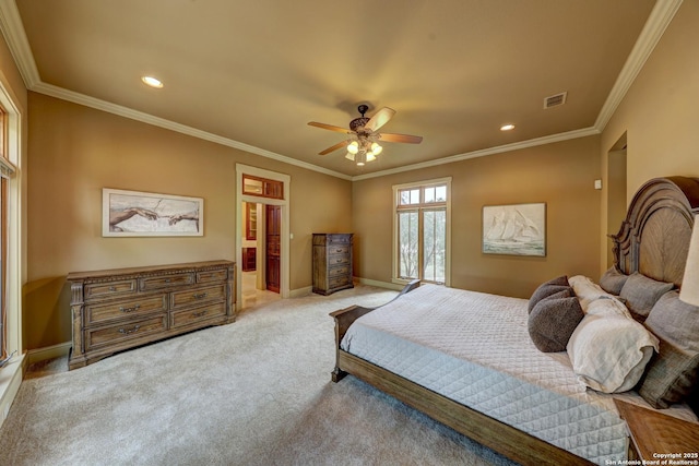 1104 Lois St, Kerrville, TX 78028 - carpeted bedroom with ornamental molding, recessed lighting, baseboards, ensuite bath, and ceiling fan