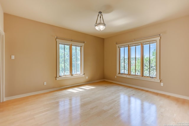 1104 Lois St, Kerrville, TX 78028 - unfurnished room with wood finished floors and baseboards