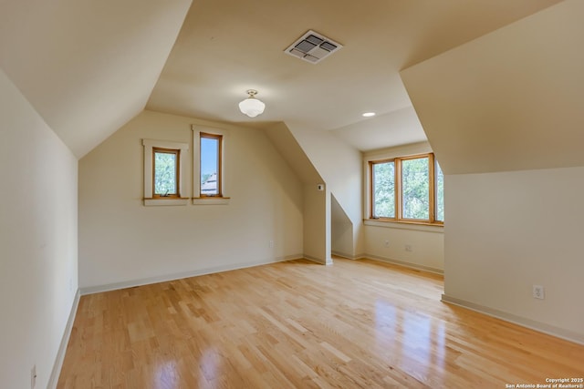 1104 Lois St, Kerrville, TX 78028 - bonus room featuring lofted ceiling, light wood-type flooring, and baseboards