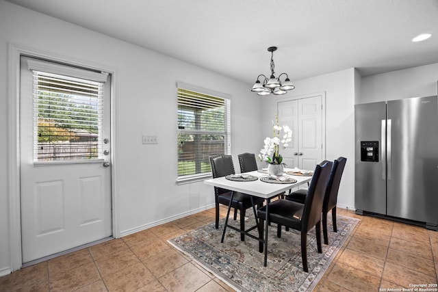 102 Ville Serene, San Antonio, TX 78253 - dining space with a chandelier, light tile patterned floors, and baseboards