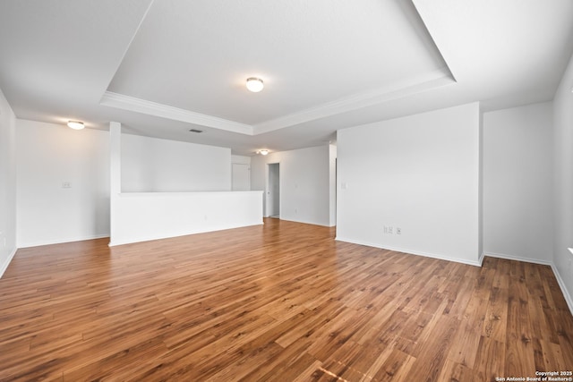 102 Ville Serene, San Antonio, TX 78253 - unfurnished room featuring a raised ceiling, wood finished floors, crown molding, and baseboards