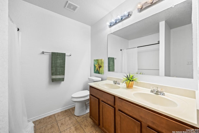 102 Ville Serene, San Antonio, TX 78253 - bathroom featuring toilet, baseboards, tile patterned floors, double vanity, and curtained shower