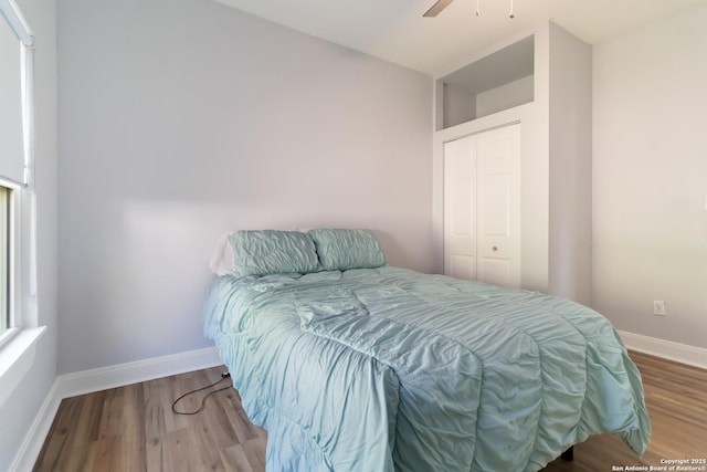 944 Fulton, San Antonio, TX 78201 - bedroom featuring wood finished floors, baseboards, and a ceiling fan