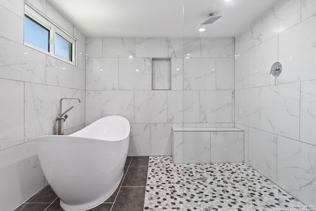 944 Fulton, San Antonio, TX 78201 - full bath featuring tile walls, a soaking tub, a tile shower, and tile patterned flooring