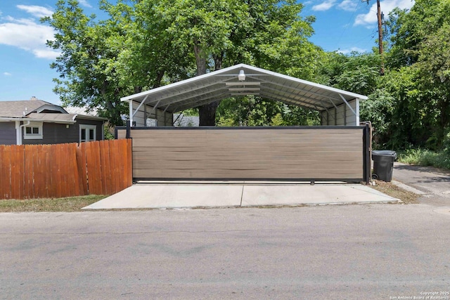 944 Fulton, San Antonio, TX 78201 - garage featuring a carport and fence
