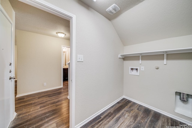 12358 Erstein, Selma, TX 78154 - laundry room with hookup for a gas dryer, hookup for a washing machine, dark wood-type flooring, a textured ceiling, and baseboards