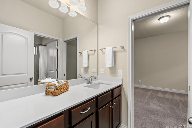 28114 Versant, Boerne, TX 78015 - bathroom with vanity and baseboards