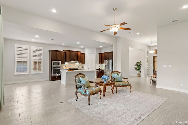 28114 Versant, Boerne, TX 78015 - living area with a ceiling fan, recessed lighting, and light wood-style flooring