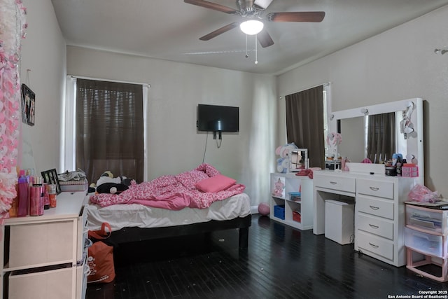 910 Halliday, San Antonio, TX 78210 - bedroom with dark wood-style flooring and ceiling fan