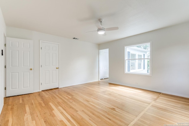 123 W Mandalay, San Antonio, TX 78212 - unfurnished bedroom featuring light wood-type flooring, baseboards, and ceiling fan