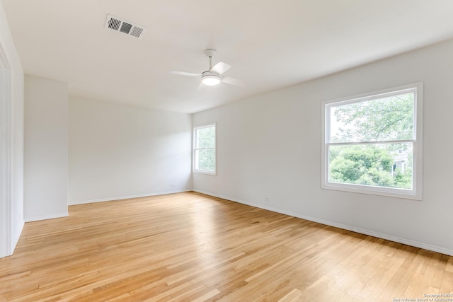 123 W Mandalay, San Antonio, TX 78212 - spare room with light wood-style floors, baseboards, and ceiling fan