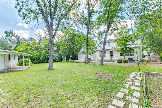 123 W Mandalay, San Antonio, TX 78212 - view of green lawn featuring a patio area