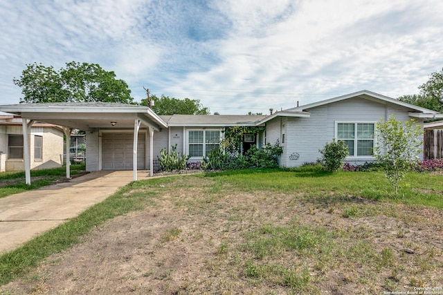 4439 Tropical Dr, San Antonio, TX 78218 - ranch-style house featuring a carport, driveway, a garage, and a front yard