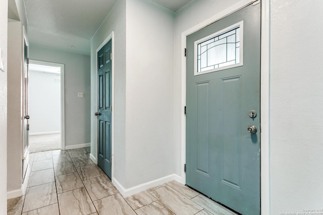 4439 Tropical Dr, San Antonio, TX 78218 - entrance foyer featuring light marble finish flooring and baseboards