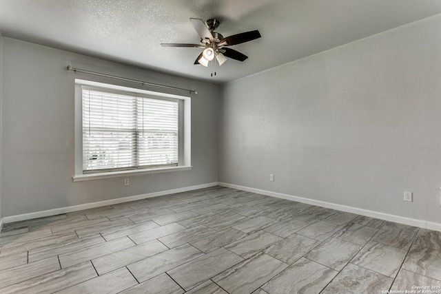 4439 Tropical Dr, San Antonio, TX 78218 - unfurnished room with ceiling fan and baseboards