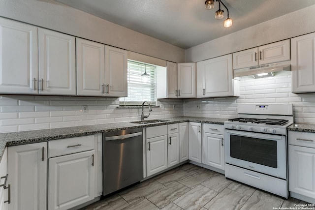 4439 Tropical Dr, San Antonio, TX 78218 - kitchen featuring white gas range oven, stainless steel dishwasher, under cabinet range hood, a sink, and white cabinets