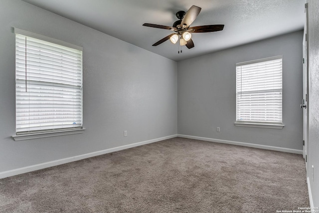 4439 Tropical Dr, San Antonio, TX 78218 - carpeted empty room with a ceiling fan and baseboards