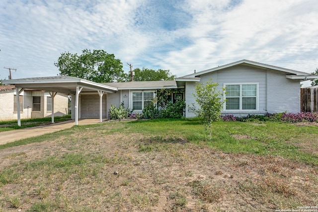 4439 Tropical Dr, San Antonio, TX 78218 - ranch-style home featuring a garage, a front lawn, and concrete driveway