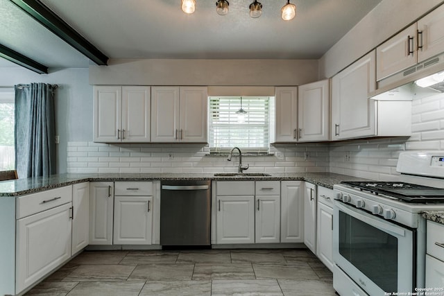 4439 Tropical Dr, San Antonio, TX 78218 - kitchen featuring white range with gas stovetop, a sink, stainless steel dishwasher, under cabinet range hood, and plenty of natural light
