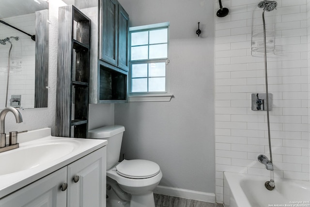 4439 Tropical Dr, San Antonio, TX 78218 - bathroom featuring toilet, vanity, washtub / shower combination, and baseboards