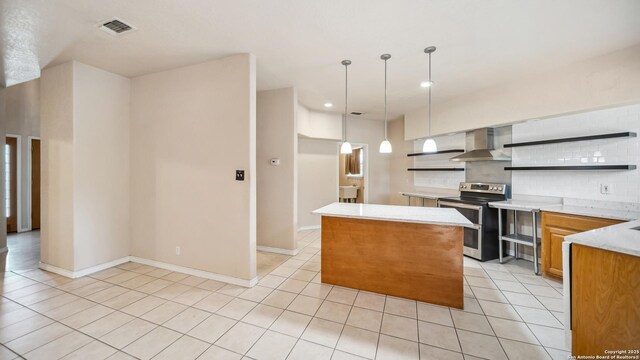 217 Sky View Dr, Adkins, TX 78101 - kitchen with range with two ovens, wall chimney range hood, open shelves, a center island, and light tile patterned floors