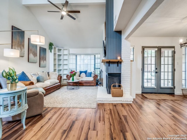 3605 Hidden Unit E1, San Antonio, TX 78217 - living area with wood finished floors, ceiling fan, plenty of natural light, and vaulted ceiling