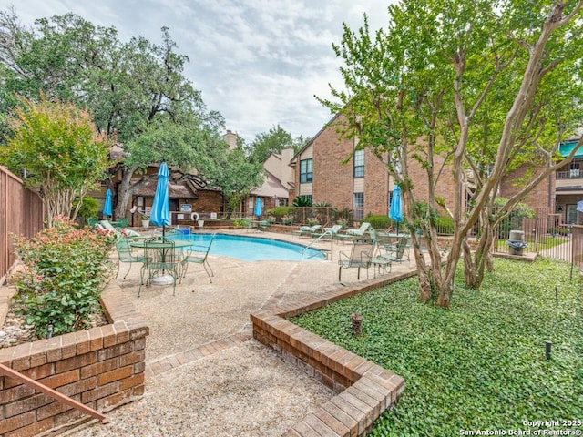 3605 Hidden Unit E1, San Antonio, TX 78217 - community pool with a patio and fence