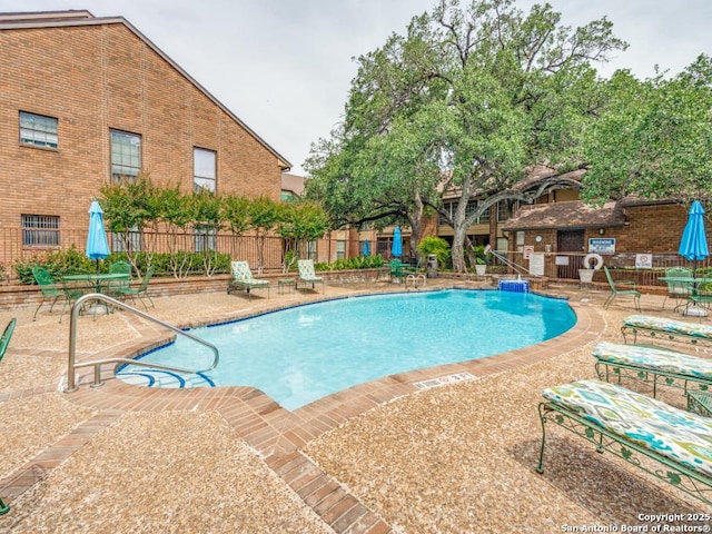 3605 Hidden Unit E1, San Antonio, TX 78217 - community pool with a patio area and fence