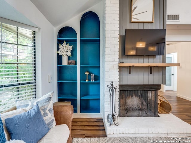 3605 Hidden Unit E1, San Antonio, TX 78217 - living room with wood finished floors and vaulted ceiling