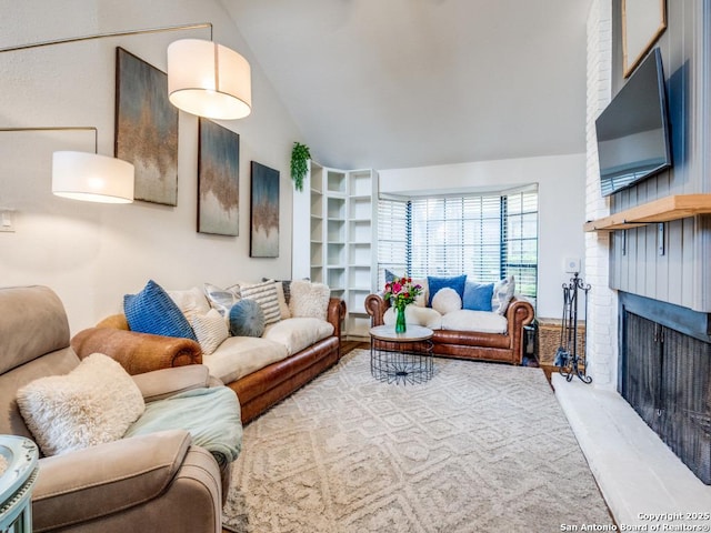 3605 Hidden Unit E1, San Antonio, TX 78217 - living area featuring a fireplace and lofted ceiling