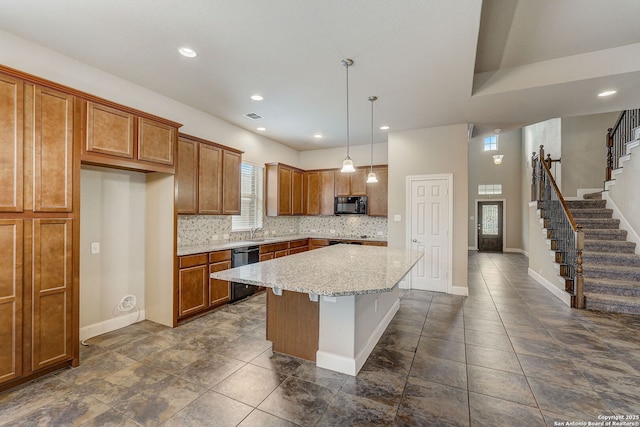 3419 Cherokee, San Antonio, TX 78253 - kitchen featuring black appliances, brown cabinets, a center island, decorative backsplash, and recessed lighting